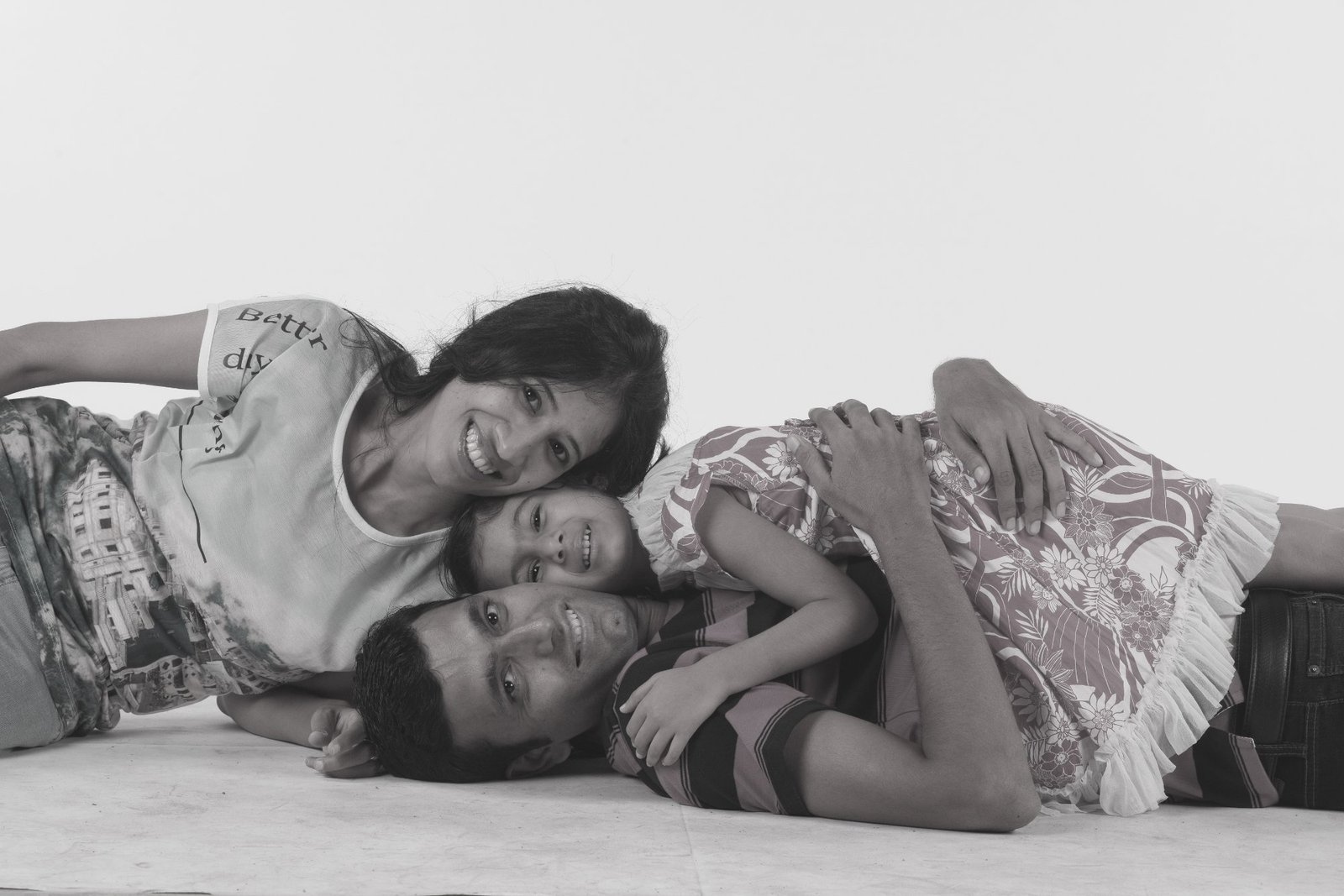 Family lying down B&W