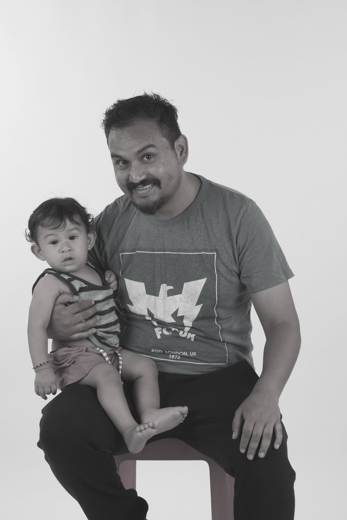 Father holding baby B&W